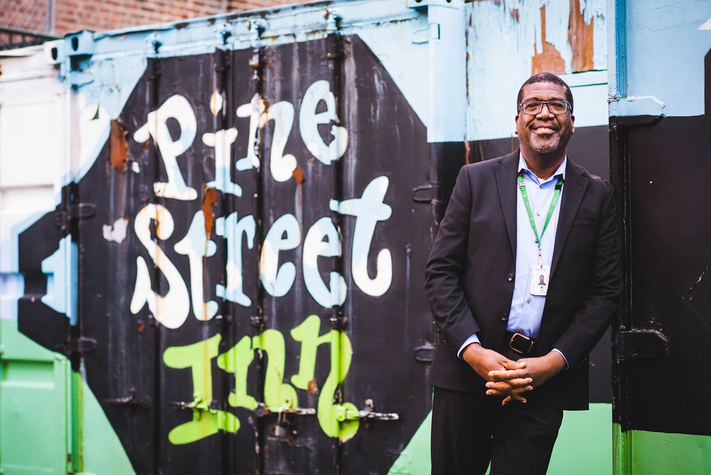 Roger Wellington stands in front of the Pine Street Inn