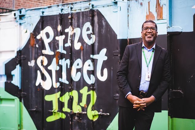 Roger Wellington stands in front of the Pine Street Inn