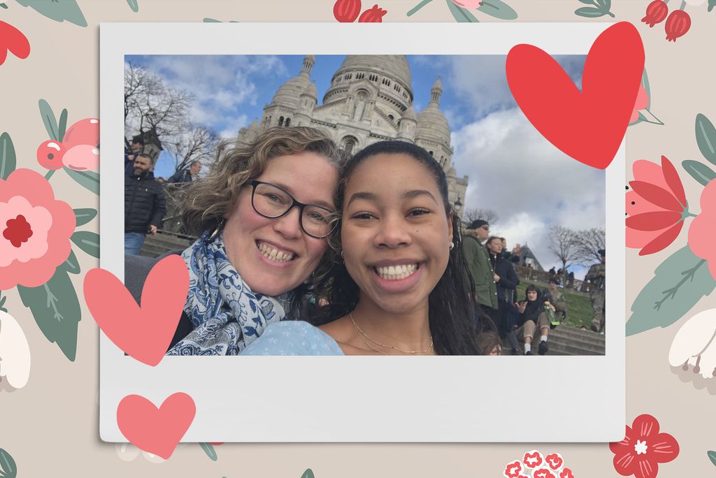 Image: Polaroid style selfie photo of a white mother and biracial, tan daughter in front of a state ouse style building. Polaroid is placed on a dark tan background with a pattern of red, tan, and pink flowers, and red hearts.