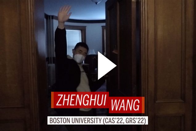 Zhenghui Wang holds his hand up to wave at the camera in the doorway of his dorm. A play button is overlayed as well as text that reads "Zhenghui Wang. Boston University (CAS'22, GRS'22)