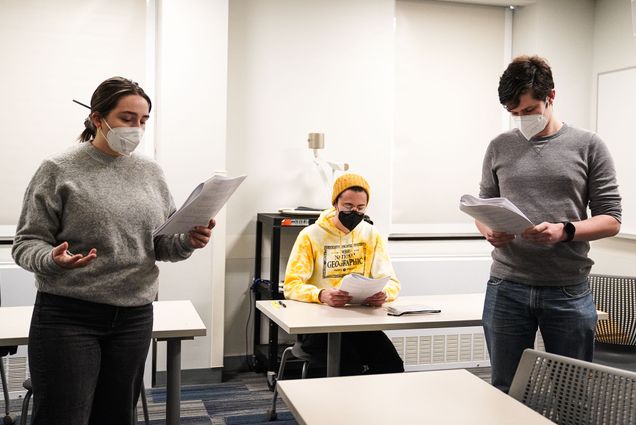 Carrie Welter (CAS’23) as Rousseau (from left), Nic Rowe (CAS’23) as Shakespeare, and Bruce Hallgren (CAS’22) as Dido rehearse for a play written by Alexandra Mascarello (CAS’23) that defends humanities studies. Photos by Mohan Ge (COM’22)