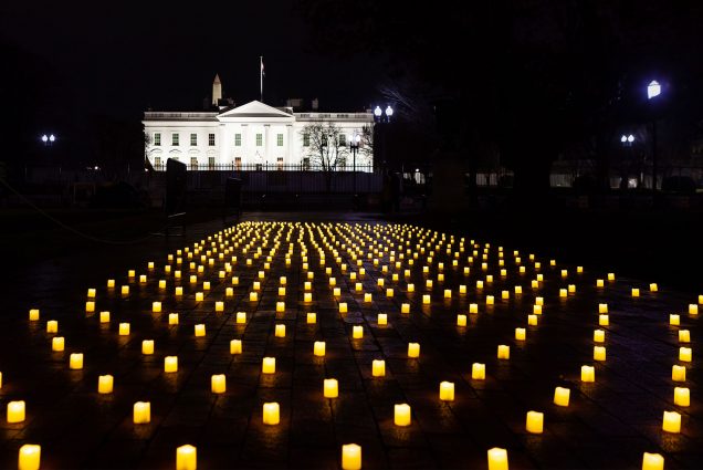 A candlelit vigil in front of the whitehouse for nurses who have died of COVID-19