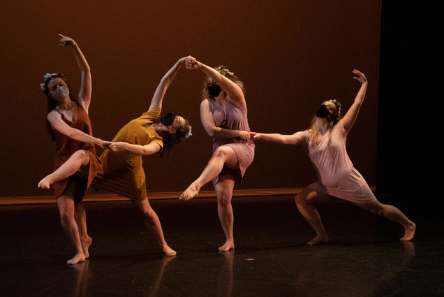 4 dancers contort their bodies on stage for Visions 2022