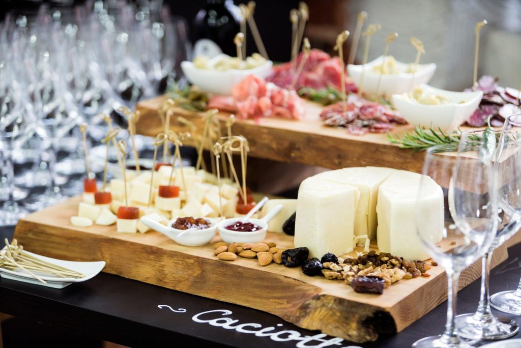 A photo of a cheese board with other Hors d'oeuvres