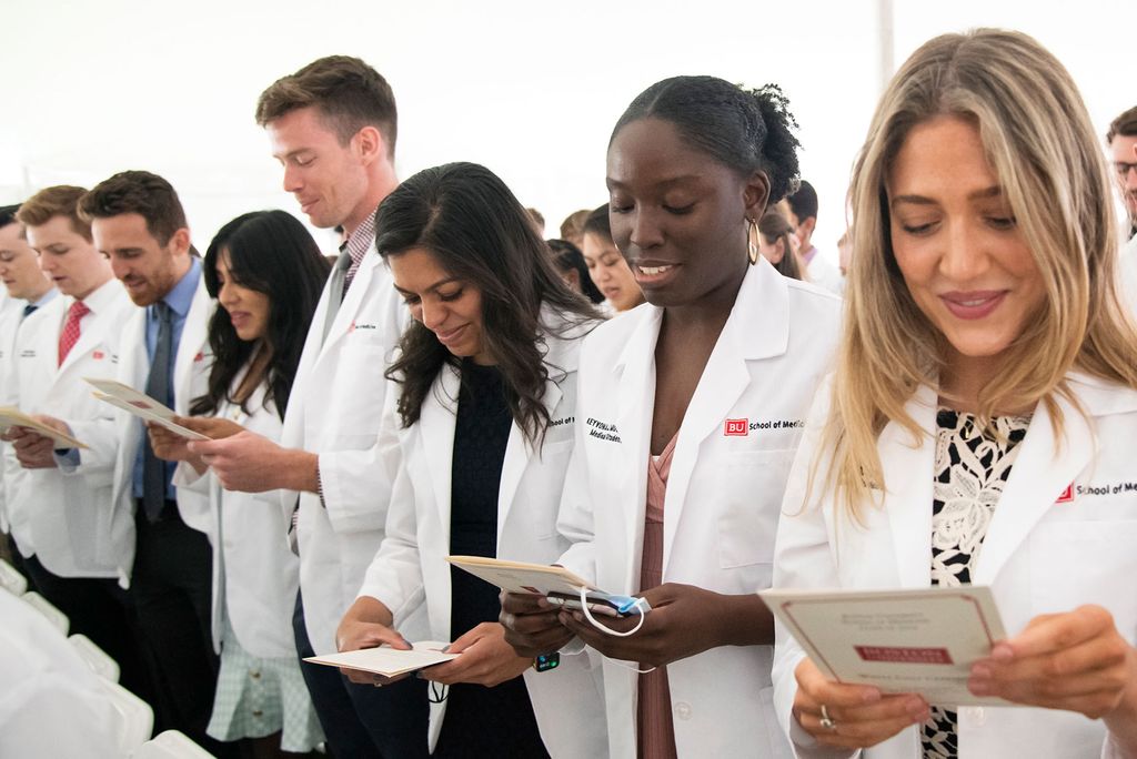 Medical students read the Hippocratic Oath during the May 2022 White Coat Ceremony.
