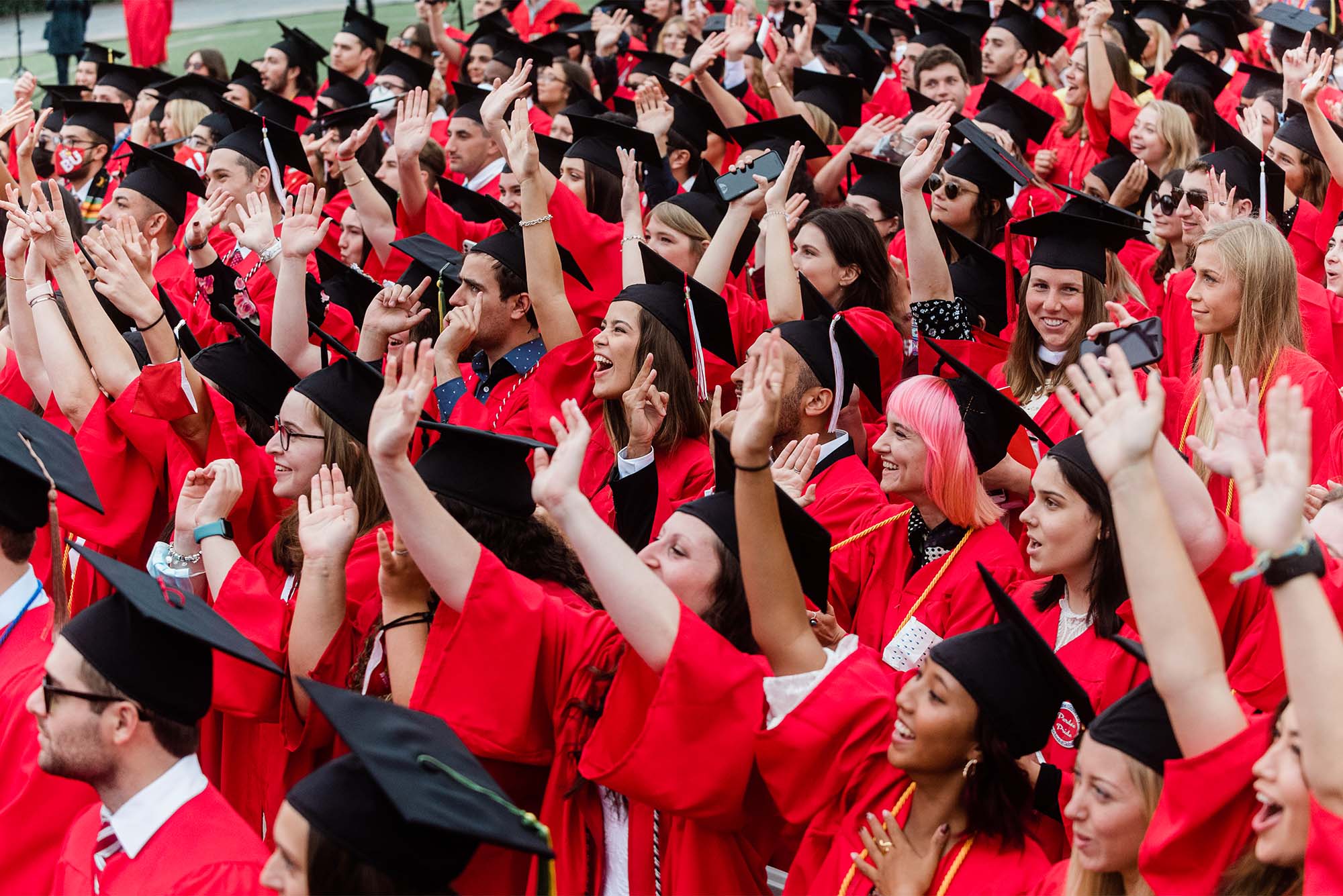 A sea of Boston University graduates in caps and gowns