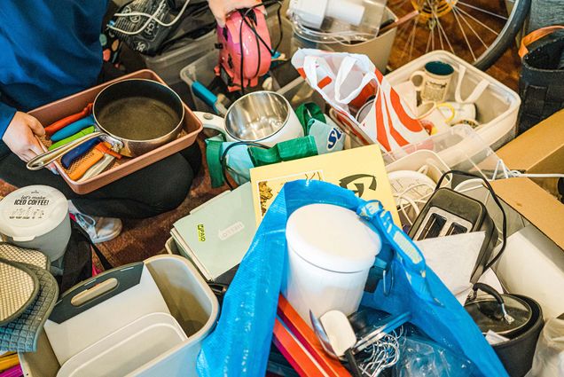 Photo: A picture of many donation bins and bags with various items inside