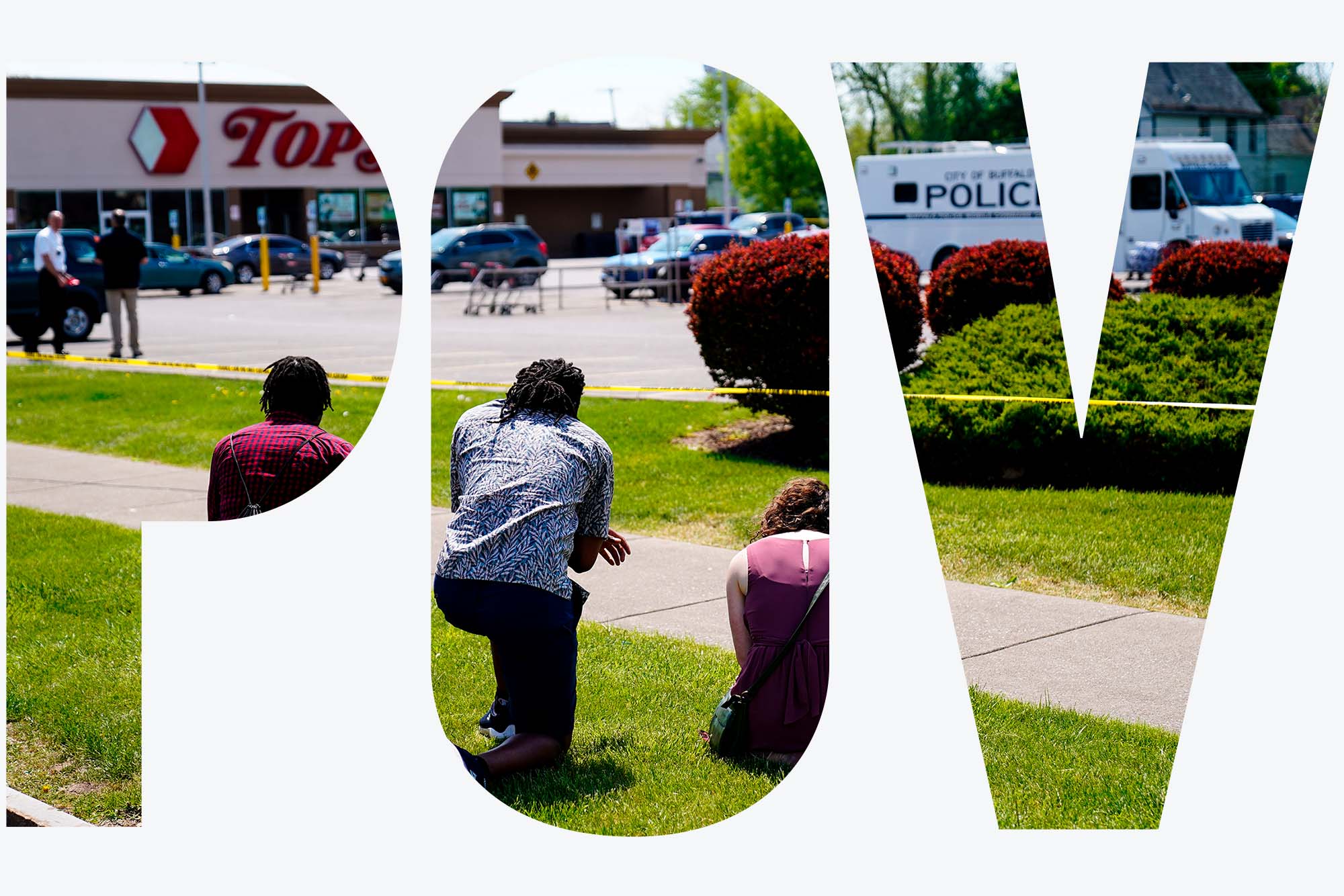 Photo of people praying, two young Black men and one White women, outside the scene of Saturday's shooting at a supermarket, in Buffalo, N.Y., Sunday, May 15, 2022. Behind them, the TOPS supermarket sign is seen across the parking lot. Also in the parking lot a parked police van. Overlay reads "POV."