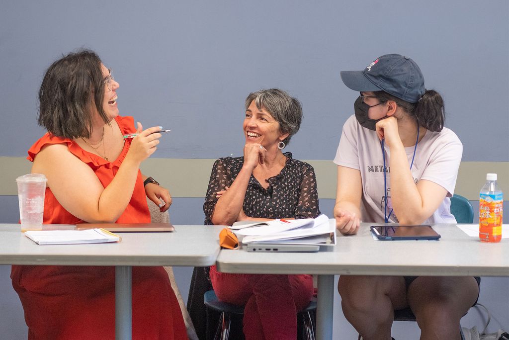 Educators Alexandra Patterson, from left, Michele Hettinger, and Stella Lehane during a National Endowment of the Humanities-funded summer institute July 13 at COM. The program will run from July 10-22 and will focus on adolescent friendships as viewed through popular media such as books, TV, and film. Photo by Cydney Scott for Boston University Photography