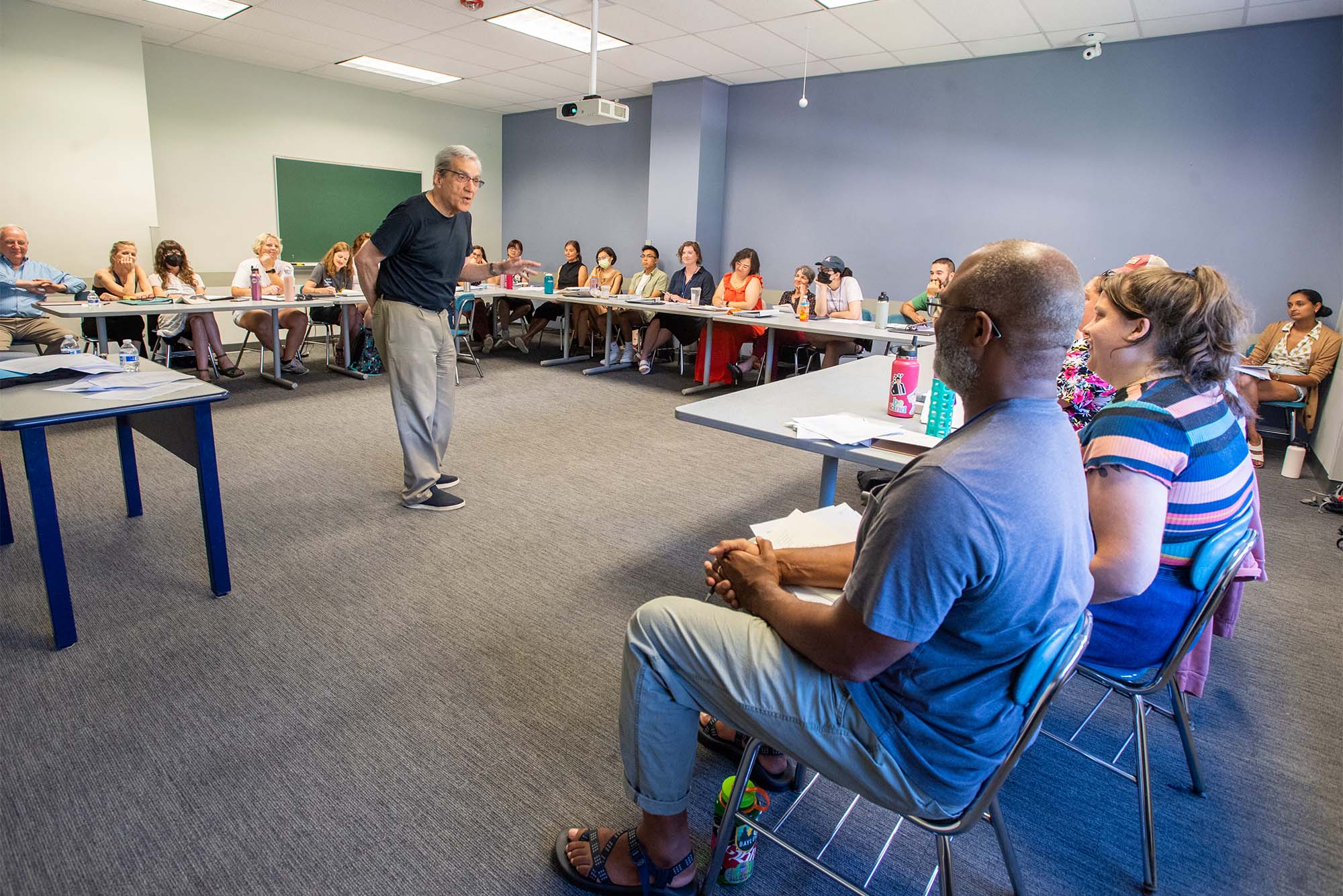 Poet laureate Robert Pinsky speaks to a room full of educators as part of a National Endowment of the Humanities-funded summer institute July 13 at COM. The program will run from July 10-22 and will focus on adolescent friendships as viewed through popular media such as books, TV, and film. Photo by Cydney Scott for Boston University Photography