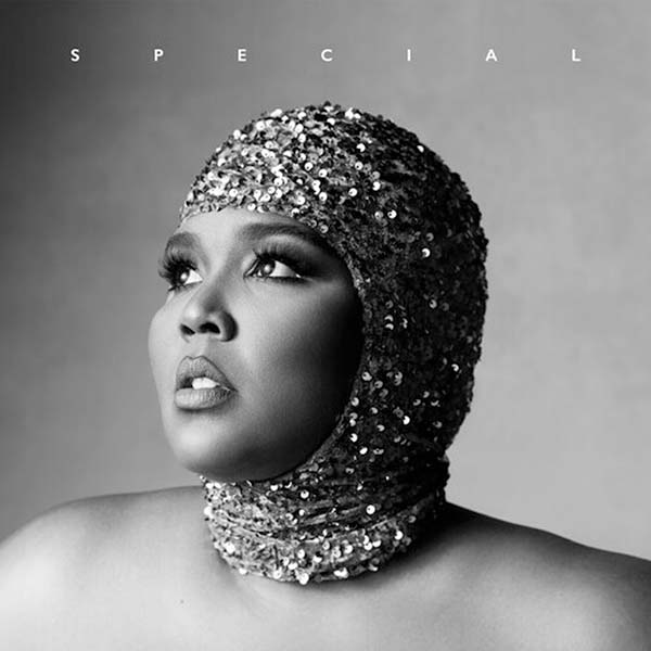 Album cover of Lizzo's 'Special,' which is written in small white letters at the top. In the cover, a headshot of Lizzo appears in black and white. She wears a head piece covered in sparkles and looks off into the middle distance.