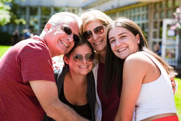 Erika Correia (COM'26), (right), takes a fiamly picture with his father Brian Correia, sister alyssa Felt, and her mother Marlene Correia after the interview. This family is from from Freetown, Massachusetts. September 2nd, 2022. Photo by Ziyu (Julian) Zhu (CGS'23)
