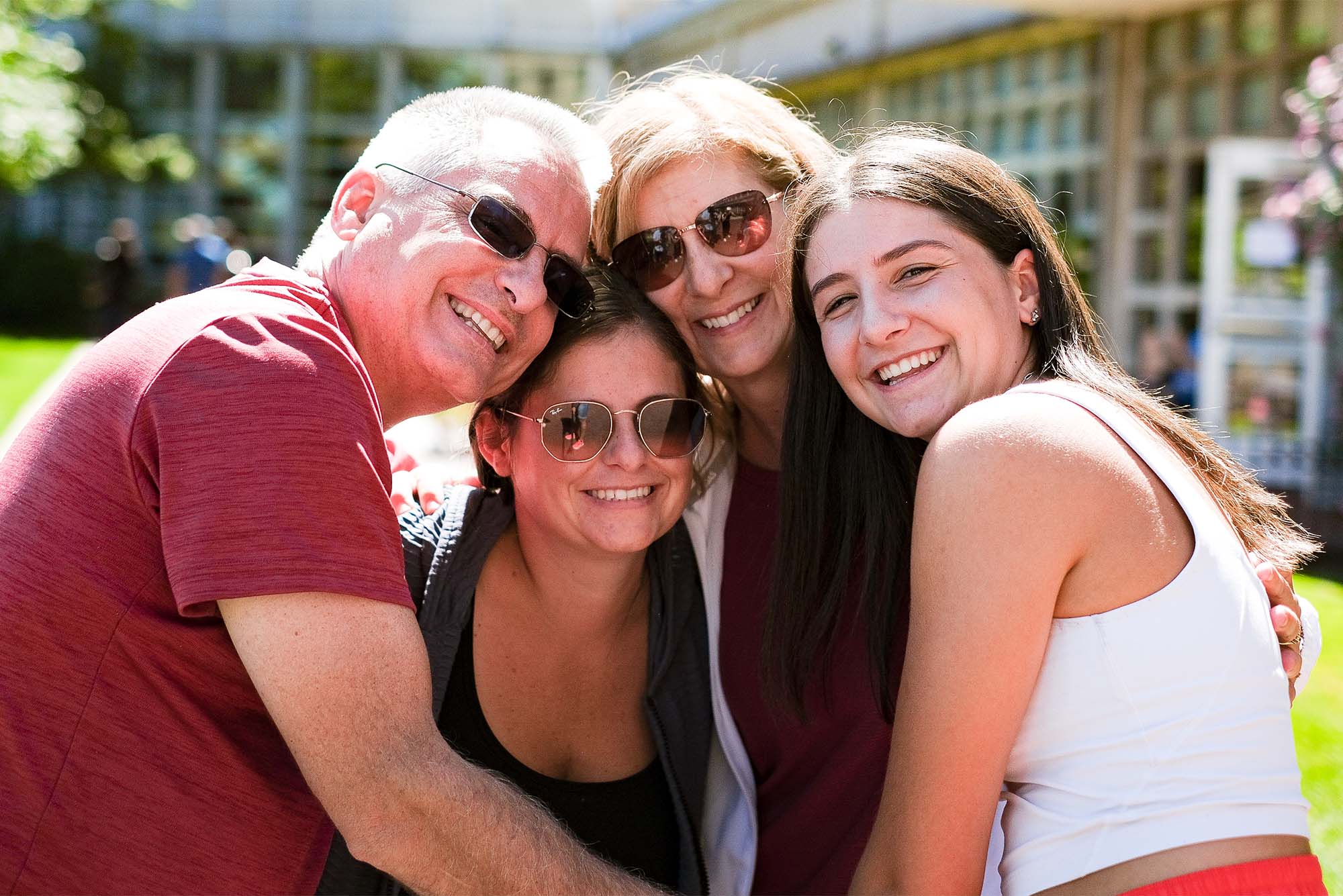 Erika Correia (COM'26), (right), takes a fiamly picture with his father Brian Correia, sister alyssa Felt, and her mother Marlene Correia after the interview. This family is from from Freetown, Massachusetts. September 2nd, 2022. Photo by Ziyu (Julian) Zhu (CGS'23)