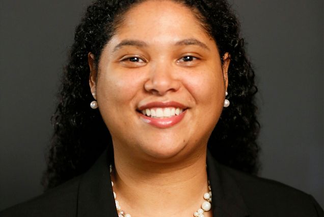 A photo of Victoria Sahani in a formal outfit for a headshot