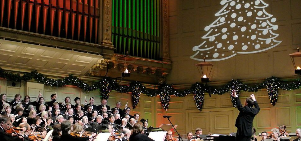 The Boston Pops performing its Holiday Pops concert at Symphony Hall in 2021. This year’s holiday show will be performed December 1 to 24. Photo by Stu Rosner