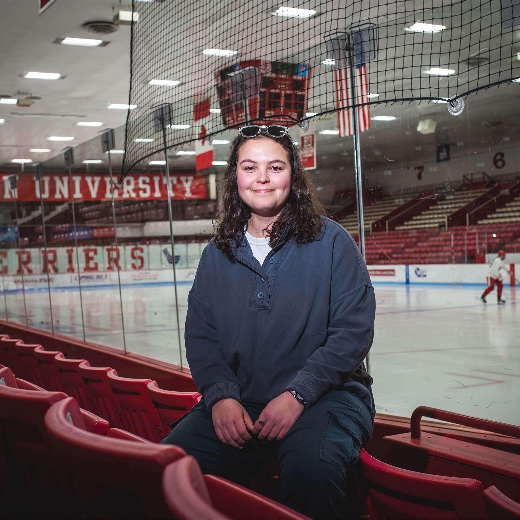 Sydney Bechtel poses for a photo at Walter Brown Arena on November 8, 2022. She is the president of the Women's Ice Hockey Club Team. Photo by Jackie Ricciardi for Boston University