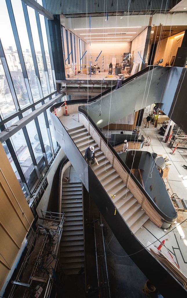 Photo: The Center for Computing and Data Sciences on October 12, 2022. Overhead shot shows continued work on the almost-finished butterfly staircase.