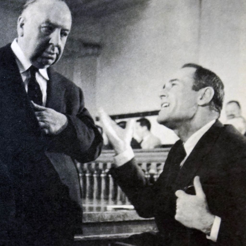 Alfred Hitchcock—seen here with Henry Fonda—was long interested in justice and its miscarriage, but The Wrong Man was the rare case where he played it straight on film. Credit: World History Archive/Alamy Stock Photo