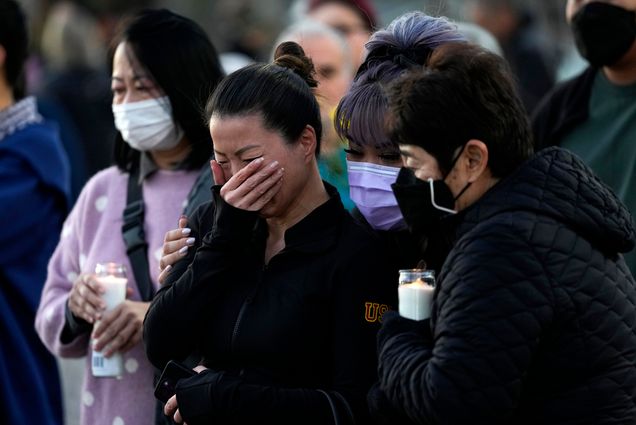 Photo: People attending a vigil outside Monterey Park City Hall, blocks from the Star Ballroom Dance Studio on Tuesday, Jan. 24, 2023, in Monterey Park, Calif. A group of Asian women are seen mourning and crying at a vigil. At front, one Asian woman covers her face as she cries, as two masked women comfort her on either side.