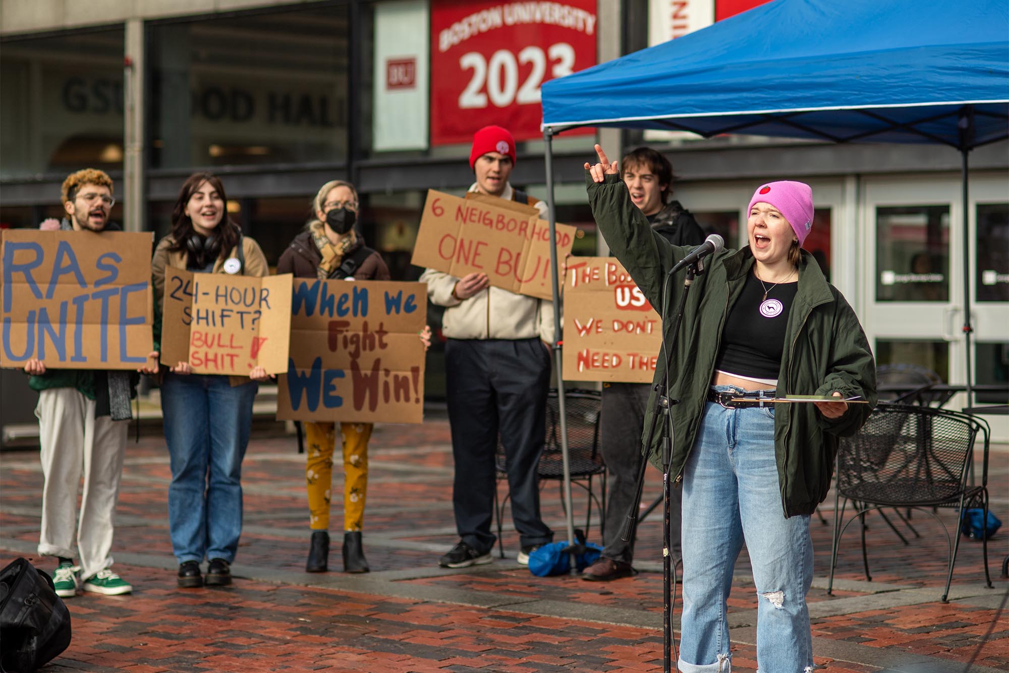 2/8/23 -- Boston, MassachusettsBaiden Wright (CAS’23) an RA at Myles Standish Hall takes tot he mic during a rally in the GSU Plaza for the unionization of Residence Assistance Feb 8. The group is unionizing for, among other things, dining plans for all, guaranteed medical leave, mental health care, stipends for RAs and housing security.Photo by Cydney Scott for Boston University Photography