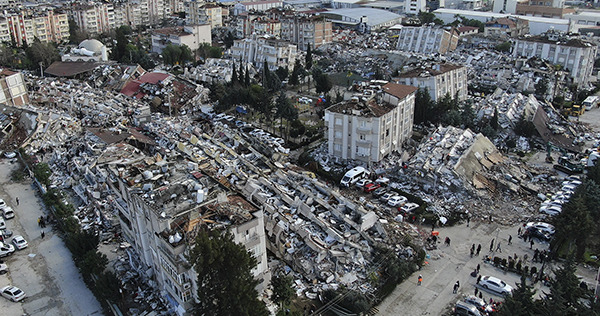 Photo: Aerial photo shows the destruction in Hatay city center, southern Turkey, Tuesday, Feb. 7, 2023. A city center is shown with numerous collapsed and crumbling building.