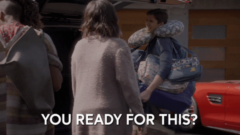 GIF: A man who has overpacked for a trip.
