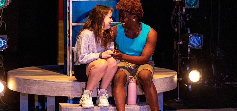 Photo: Jaden Bridges (CFA’25), in tank top, and Talia Sulla (CFA’23) rehearsing for Nathan Alan Davis’ “Dontrell, Who Kissed the Sea,” directed by Malika Oyetimein, April 18. Photo by Will Chapman (COM’26)