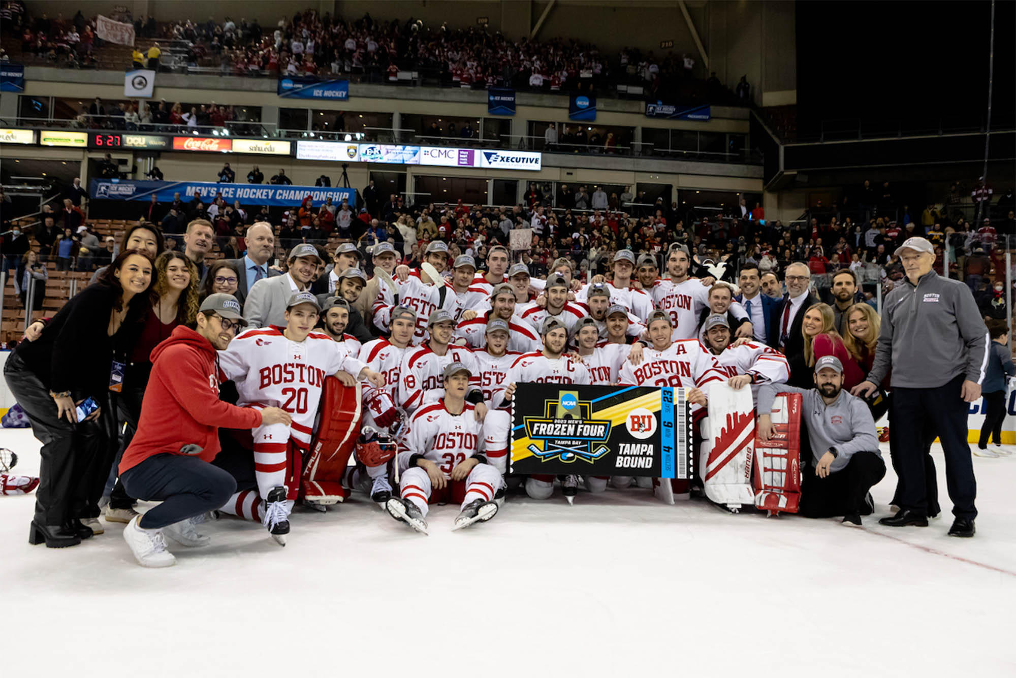 Photo: The BU Men's Hockey team poses for a photo after winning the Patriot League championship in 2023