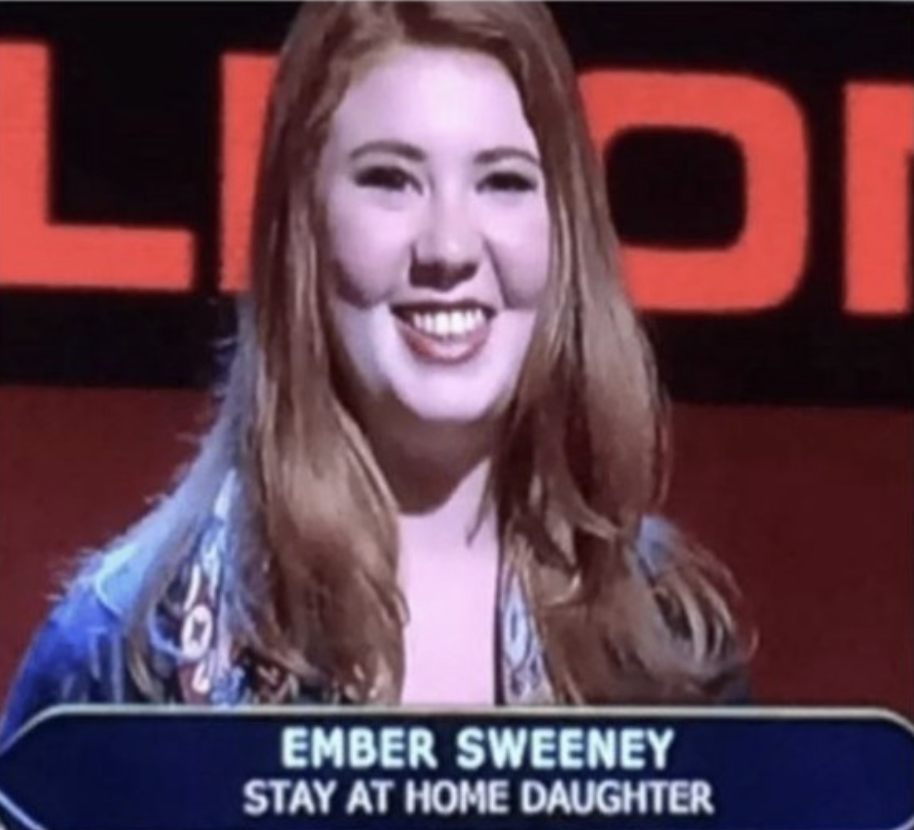 A picture of a girl smiling from a TV show with her credentials showing below her name. Her name reads as Ember Sweeney and her job title is "Stay at Home Daughter"