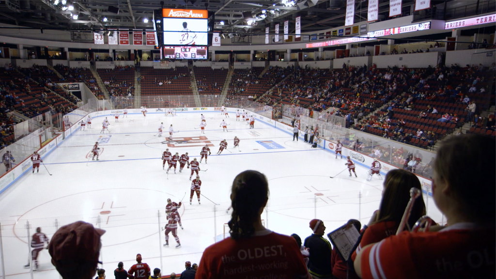 A still frame from a video (courtesy of BU Video) shows crowds of attendees inside of Agganis Arena cheering on a BU Hockey Game.
