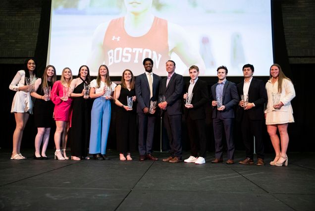 Photo: Boston University athletic honorees gather at the annual Scarlet & White Honors banquet. Caitlin Weimar (from left), Emily Gant, Caitlin Coker, Kayla Roncin, Rachel Borzymowski, Megan Mastrorilli, Walter Whyte, Phil DeCarlo, Lane Huston, Domenick Fensore, Roy Meyer, and Maggie Lohrer. Photo by Matt Woolverton