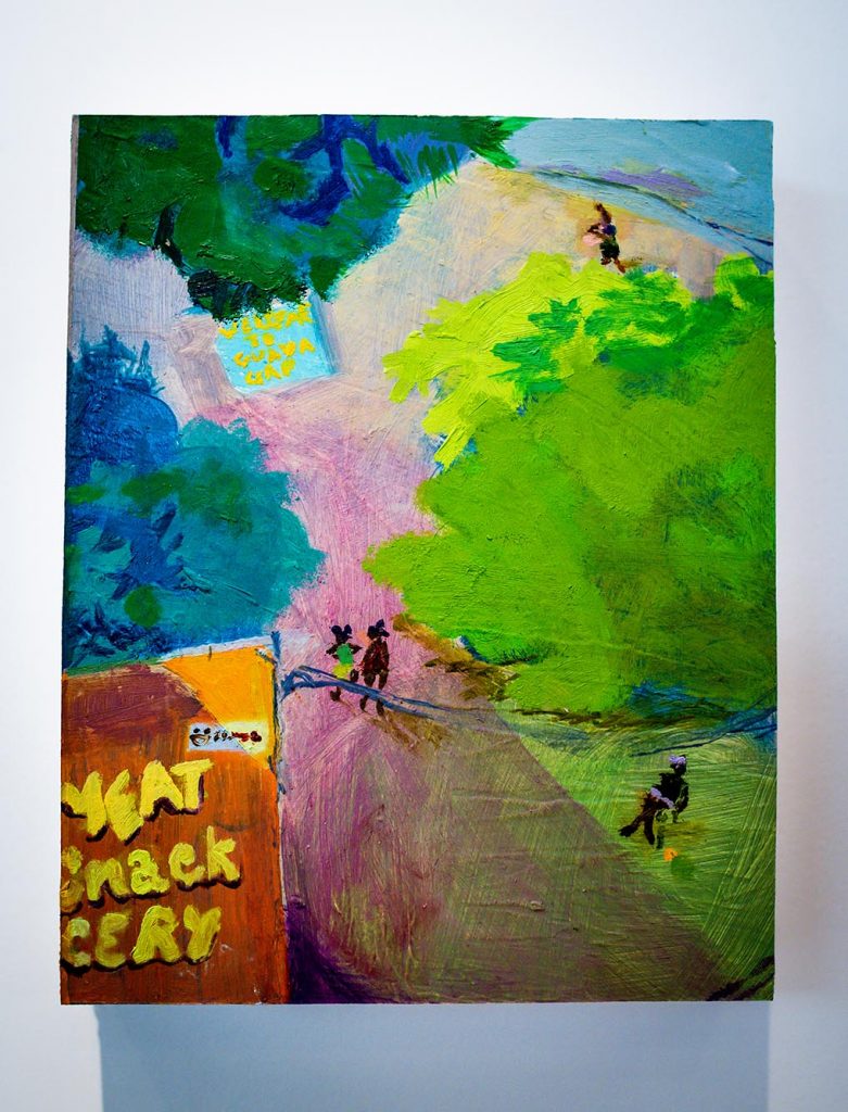 Photo: Painting by Asjha Malcolm is displayed. Painting features abstract green and blue and pink scene. Appears to be a large trail with small figures walking, working, and lunging on it.