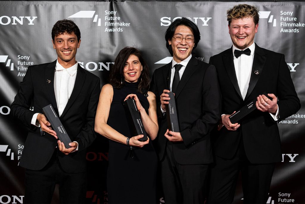 Photo: Multiple award winners in black tie attire pose with trophies at the Sony future Filmmaker Awards. Seonghoon Eric Park (third from left) poses with winners of the Sony Future Filmmaker Awards, held in February at the Sony Pictures Studio lot in Culver City, Calif. Photo courtesy of Creo 