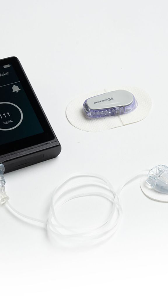 Photo: A flatlay of the iLet Bionic Pancreas, a bionic pancreas approved at the FDA. The device is a black box with a wire attached with two additional attachments