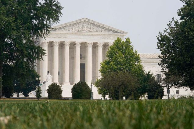 Photo: The U.S. Supreme Court is seen on Thursday, June 29, 2023, in Washington. A large white building with looming pillars is shown on a sunny day.