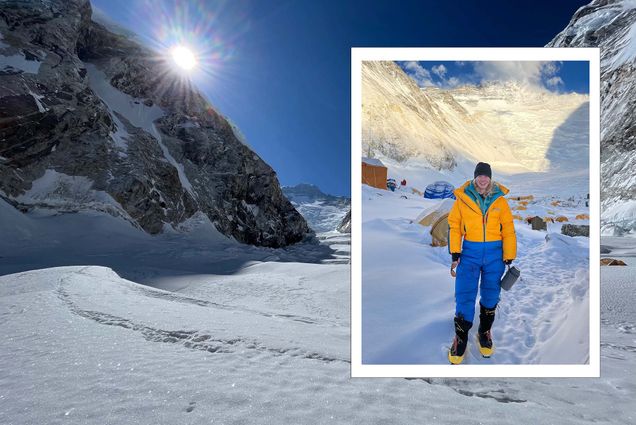 Photo: A composite image of a horizontal shot of a peak on Mt. Everest. Snow covers the ground and the elevated areas while the sun is shining bright in the background. The layered image is of a white woman with a tangerine-colored snow jacket and blue snow pants. She stands with her arms relaxed, smiling for the camera. There is a white border frame around the image.