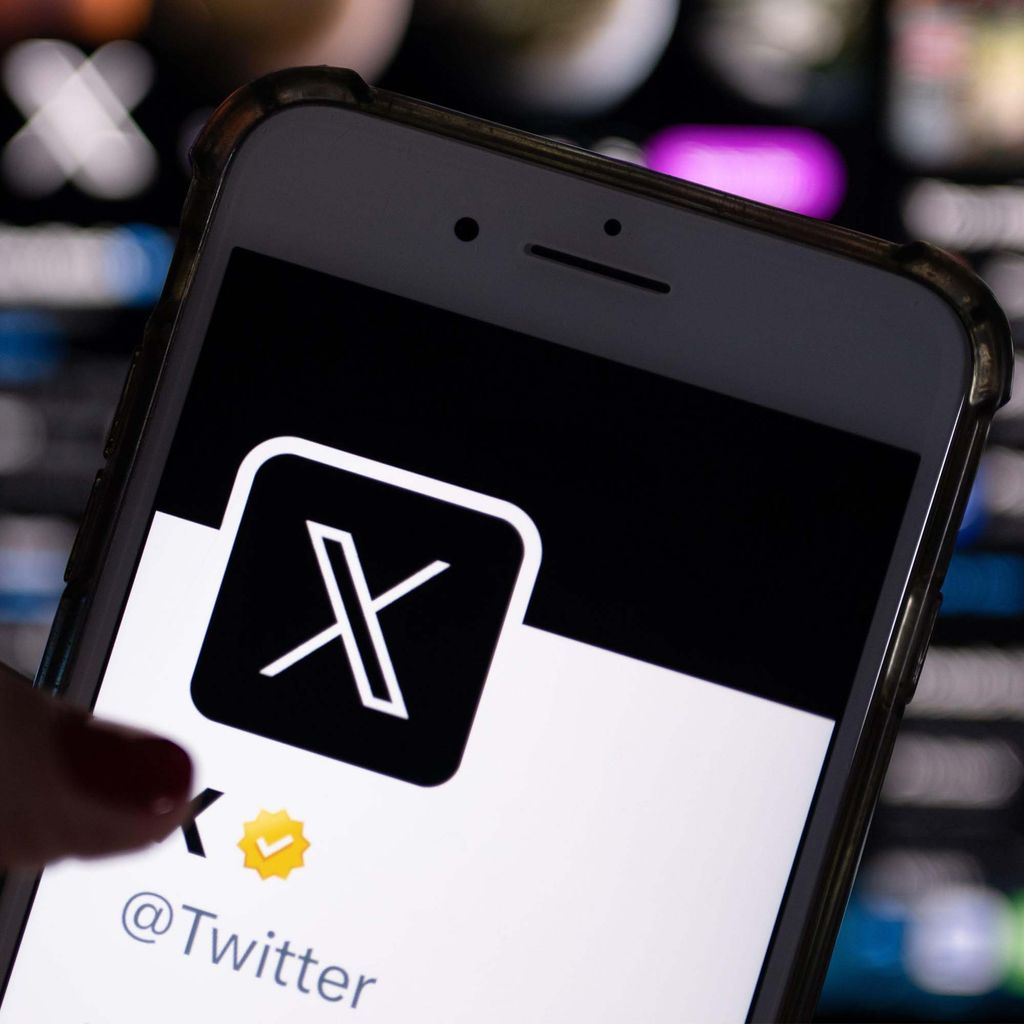 Twitter's official profile on a smartphone screen features the white letter X on a black background. Twitter owner Musk is trying to establish X as the new name for the short messaging service. Photo: Monika Skolimowska/dpa