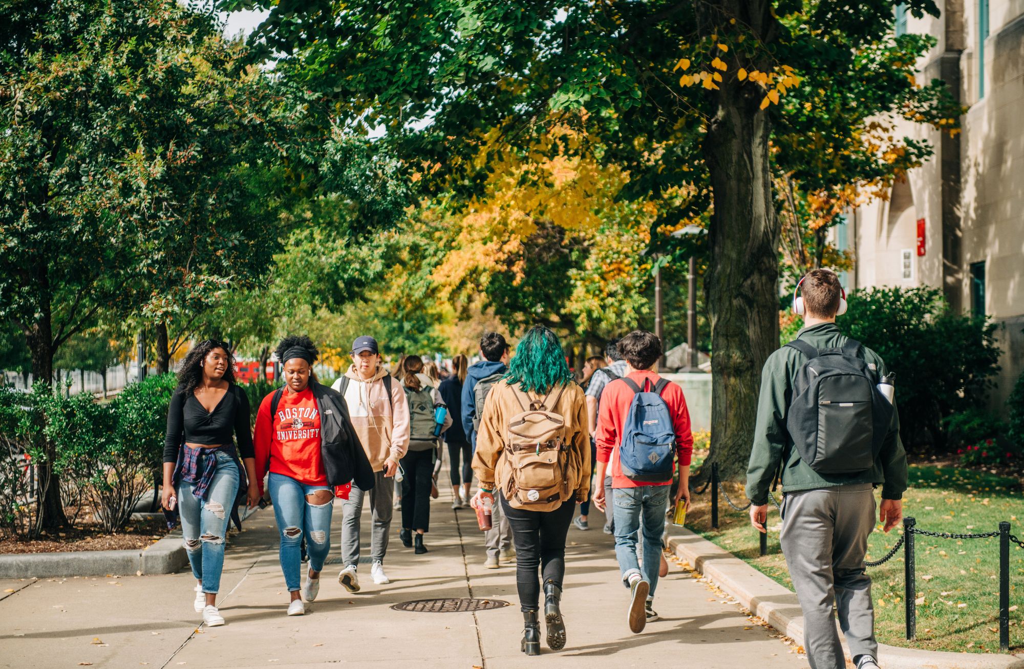 Photo: Boston University students representing multiple races walk down the side walk of Comm Ave in Boston