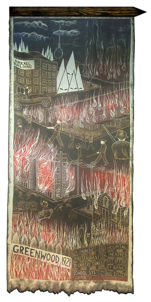 Image: Justyne Fischer artwork of woodcut on voile with stain, wax, burned pine fence picket shows scene of a Greenwood town circa 1921 on fire. At the top of the work three figures wearing KK masks are shown next to a sign that reads "Drexel Building". On the bottom right the number of buildings that were destroyed are listed.