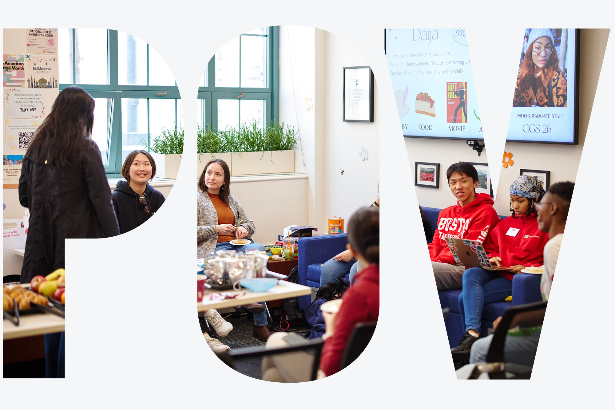 Photo: Students hang out, chat, and eat in a smaller, brightly lit room. A large center table includes things to munch on like muffins and fruit as students sit around it in chairs and chat with each other. Photo is seen through a white overlay with transparent letters that read "POV".