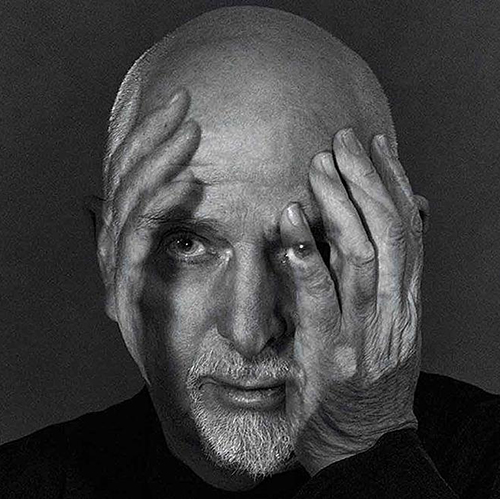 Image: Album covers features a black and white photo of Peter Gabriel, an older man with gray mustache and beard wearing a black shirt. He holds his head in one hand while another hand is photoshopped to cradle the other side of his head.