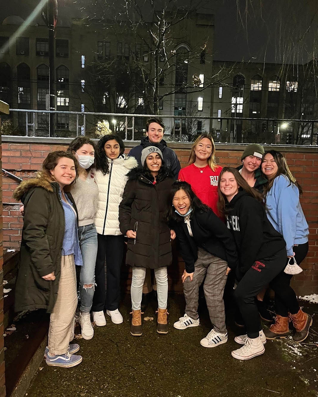 Photo: Madhri Yehiya and her fellow Fall 2021 Daily Free Press E-board pose in the cold Boston winter setting for a photo together.