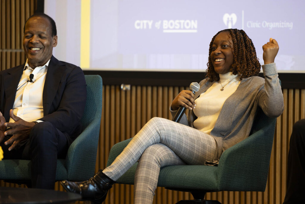Photo: President of BU SOCA and youth leader Brianna Bourne(CAS’24), right, chat on the stage at the Civic Center Summit hosted at BU.