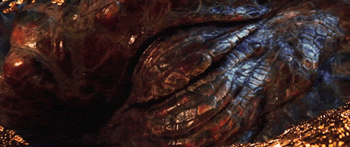A gif of a dragon's eye opening from the movie “The Hobbit: The Desolation of Smaug” 