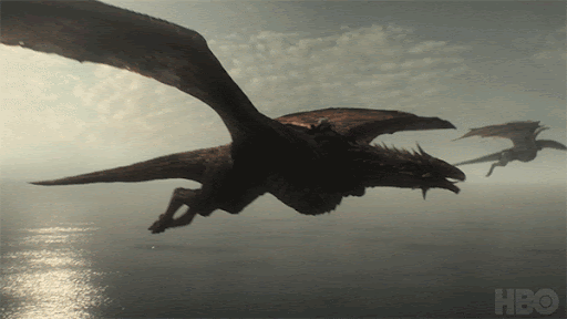 A gif from the show House of Dragons. The gif features two dragons flapping through a grey sky. 
