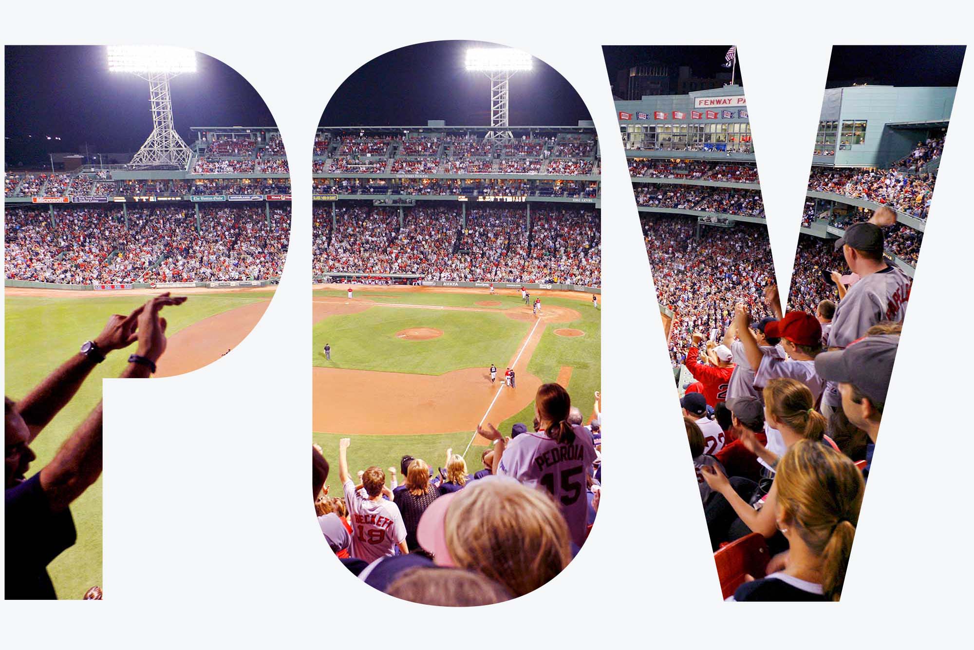 Photo: A wide shot of fans cheering at a game at Fenway stadium.