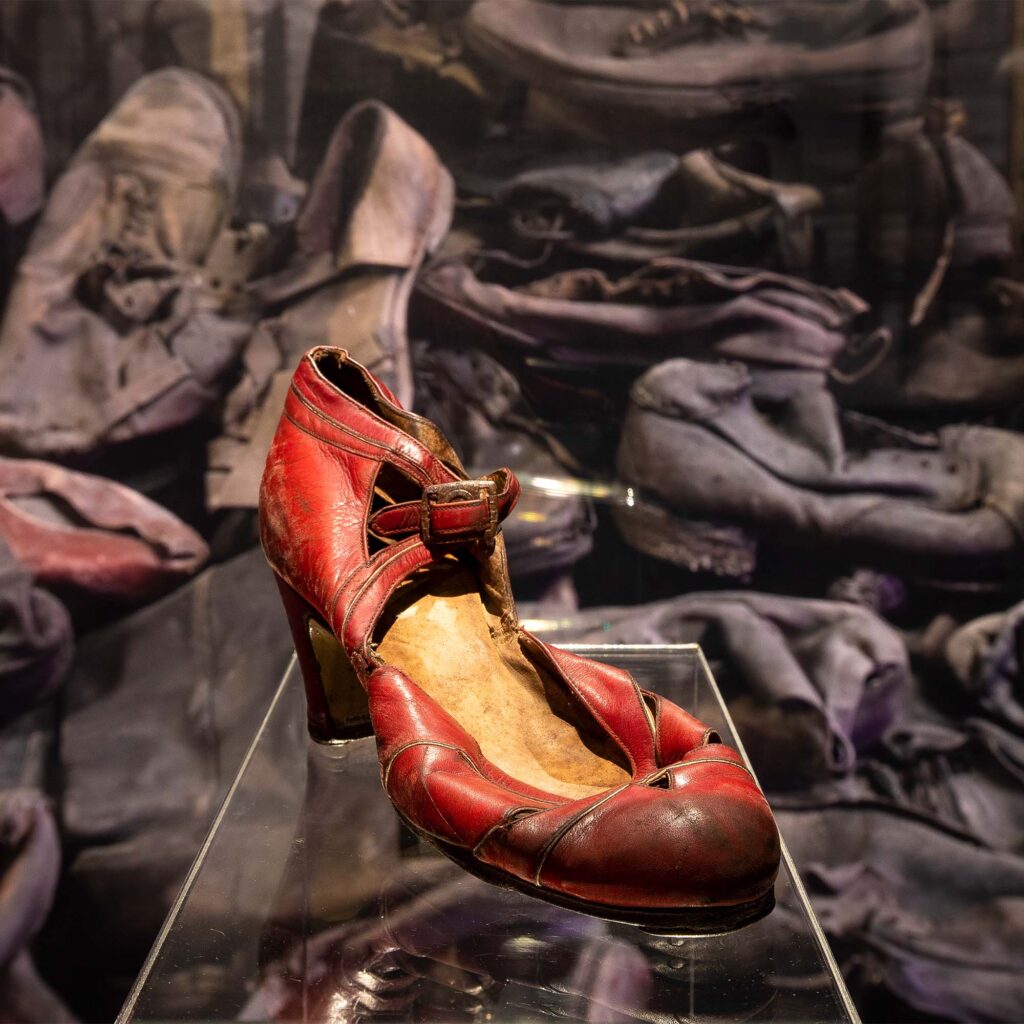 Photo: A woman’s dress shoe taken from a detainee at Auschwitz concentration camp