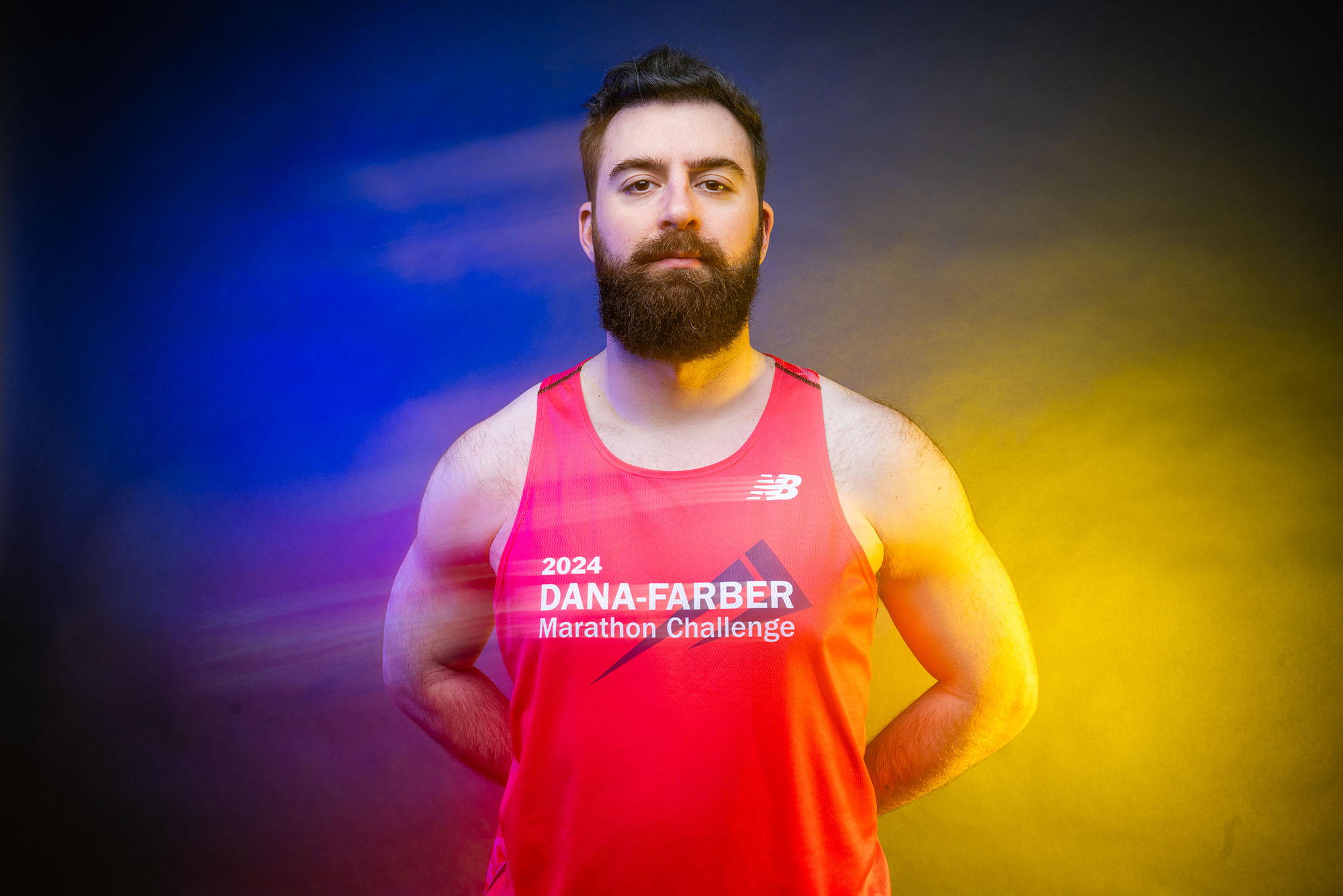Photo: A picture of a man in a tank top that reads "2024 Dana Farber Marathon Challenge"