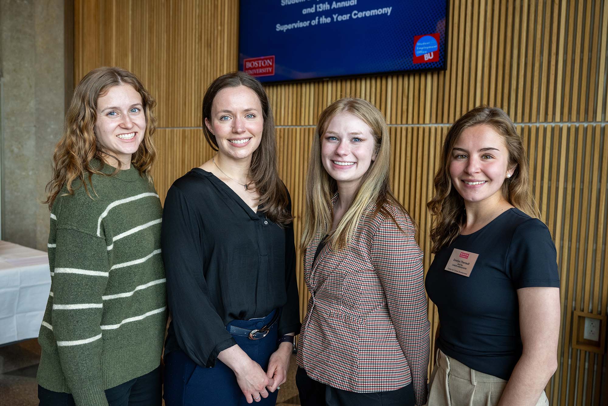 Photo: A photo of four individuals. From left, Graduate Student Employee of the Year