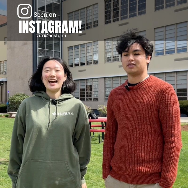 Photo: A picture of two people standing in front of an academic building. On the right is a man wearing an orange sweater and on the left is a girl with short hair wearing a hoodie. Text overlay reads "Seen on Instagram via @bostonu"
